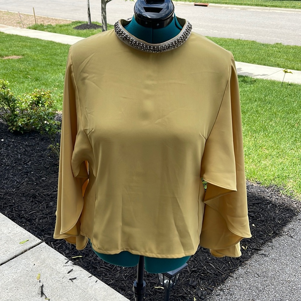 Golden flounce sleeve blouse
